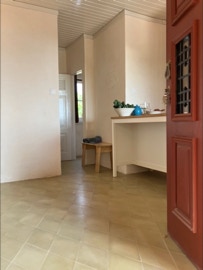 Mosaico hidráulico em formato losango aplicado numa cozinha